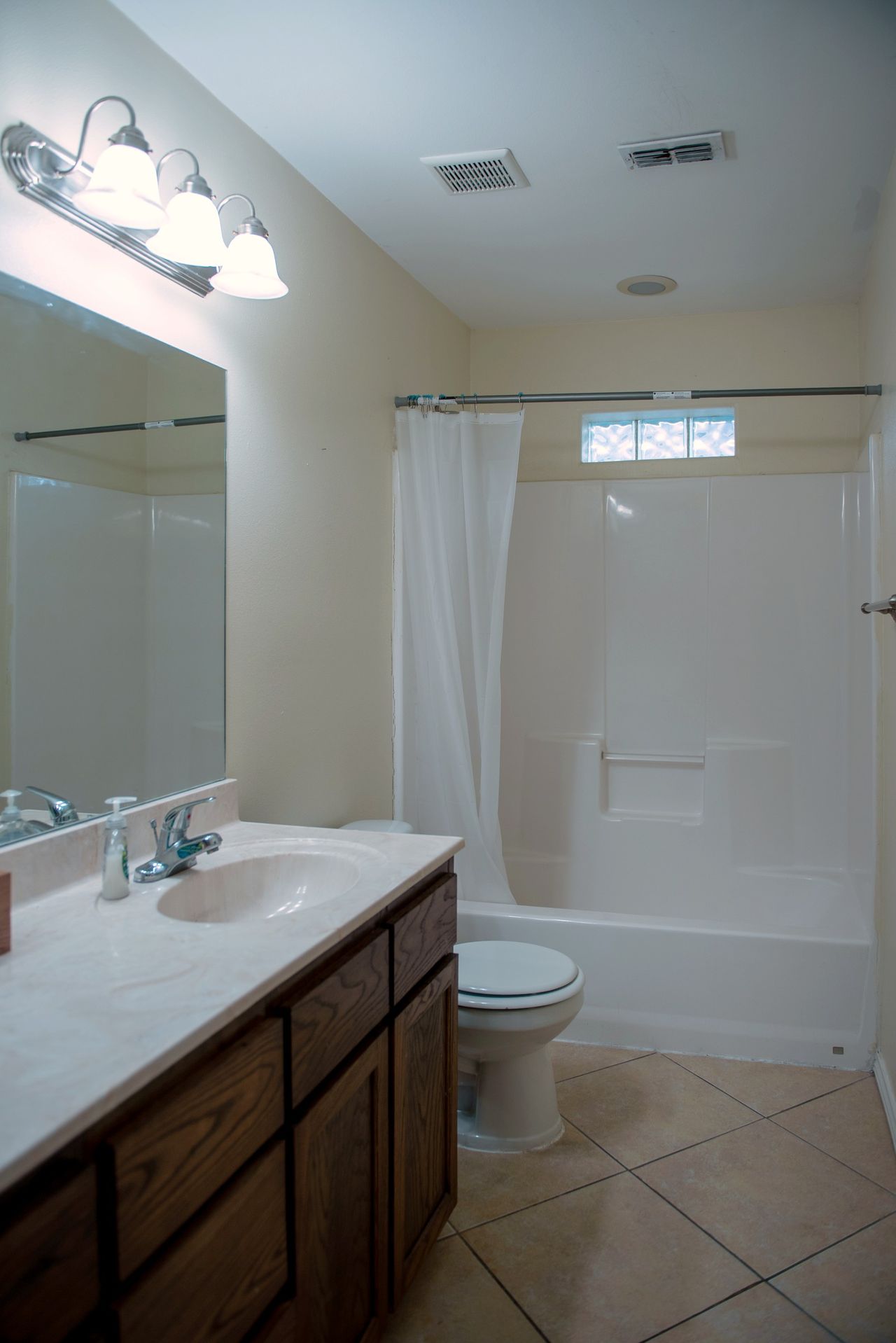 Bathroom with tub and shower